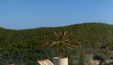 Resa Estates for sale Ibiza Vlla Aixa te koop sale lift sea views exterior day beds.jpg